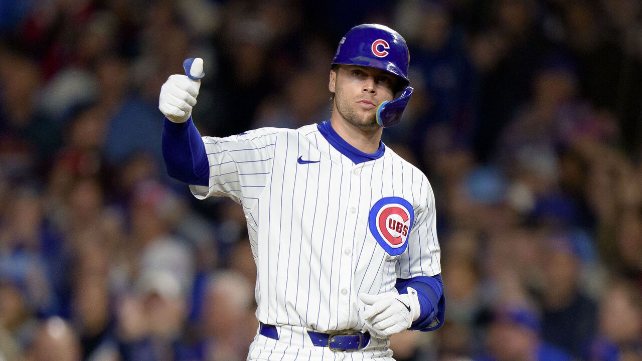 CHICAGO, ILLINOIS - OCTOBER 9: Nico Hoerner #2 of the Chicago Cubs celebrates a hit in Game Four of the National League Division Series against the Milwaukee Brewers at Wrigley Field on October 9, 2025 in Chicago, Illinois.