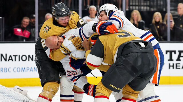 LAS VEGAS, NEVADA - MARCH 26: (L-R) Brett Howden #21 of the Vegas Golden Knights, Darnell Nurse #25 of the Edmonton Oilers, Keegan Kolesar #55 of the Golden Knights and Kasperi Kapanen #42 of the Oilers fight in the first period of their game at T-Mobile Arena on March 26, 2026 in Las Vegas, Nevada. The Oilers defeated the Golden Knights 4-3 in overtime.