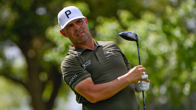 HOUSTON, TX - MARCH 27: Gary Woodland (USA) twirls his club at the end of his tee shot on 12 during the second round of the Texas Children's Houston Open on March 27, 2026, at Memorial Park Golf Course, Houston, Texas.