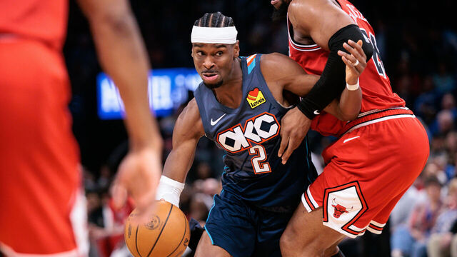 OKLAHOMA CITY, OKLAHOMA - MARCH 27: Shai Gilgeous-Alexander #2 of the Oklahoma City Thunder drives to the basket around Jalen Smith #25 of the Chicago Bulls during the second half at Paycom Center on March 27, 2026 in Oklahoma City, Oklahoma.