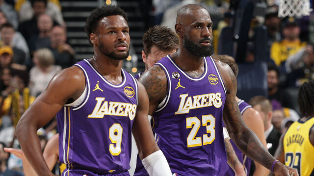 INDIANAPOLIS, IN - MARCH 25: Bronny James #9 and LeBron James #23 of the Los Angeles Lakers looks on during the game against the Indiana Pacers on March 25, 2026 at Gainbridge Fieldhouse in Indianapolis, Indiana. Mandatory Copyright Notice: Copyright 2026 NBAE
