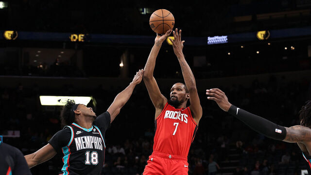 MEMPHIS, TENNESSEE - MARCH 27: Kevin Durant #7 of the Houston Rockets takes a shot against Olivier-Maxence Prosper #18 of the Memphis Grizzlies during the second half at FedExForum on March 27, 2026 in Memphis, Tennessee.