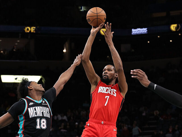 MEMPHIS, TENNESSEE - MARCH 27: Kevin Durant #7 of the Houston Rockets takes a shot against Olivier-Maxence Prosper #18 of the Memphis Grizzlies during the second half at FedExForum on March 27, 2026 in Memphis, Tennessee.