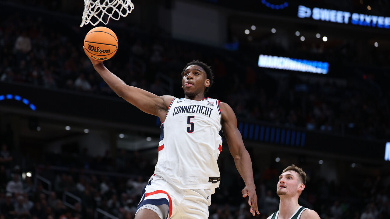 WASHINGTON, DC - MARCH 27: Tarris Reed Jr. #5 of the UConn Huskies dunks against the Michigan State Spartans during the second half in the Sweet Sixteen of the 2026 NCAA Men's Basketball Tournament at Capital One Arena on March 27, 2026 in Washington, DC.