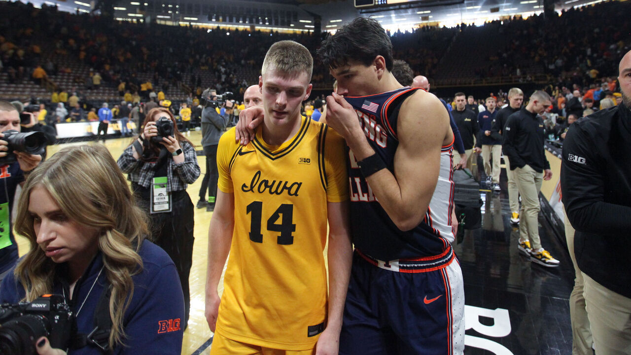IOWA CITY, IA - JANUARY 11: Guard Andrej Stojakovic #2 of the Illinois Fighting Illini talks with guard Bennett Stirtz #14 of the Iowa Hawkeyes as they walk off the court following their match-up on January 11, 2026 at Carver-Hawkeye Arena, in Iowa City, Iowa.