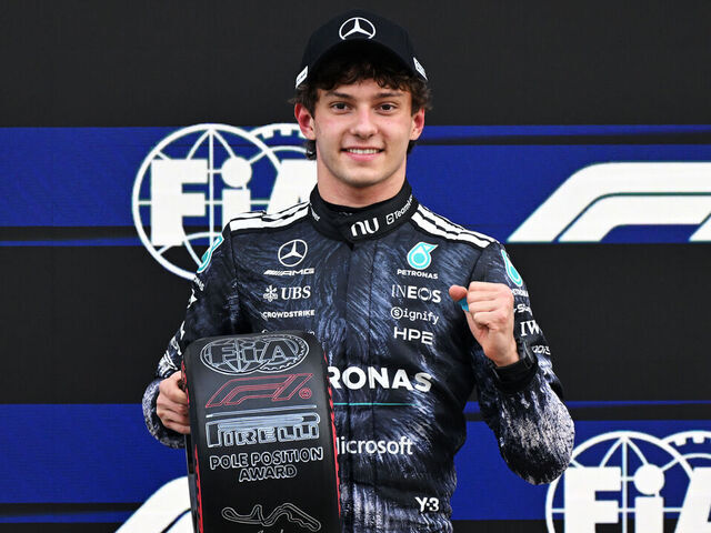 SUZUKA, JAPAN - MARCH 28: Pole position qualifier Andrea Kimi Antonelli of Italy and Mercedes AMG Petronas F1 Team with his Pirelli Pole Position award during qualifying ahead of the F1 Grand Prix of Japan at Suzuka Circuit on March 28, 2026 in Suzuka, Japan.