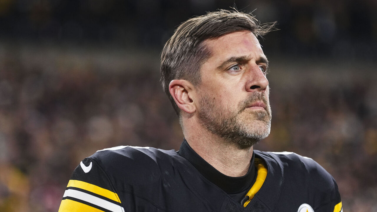 PITTSBURGH, PENNSYLVANIA - JANUARY 12: Aaron Rodgers #8 of the Pittsburgh Steelers looks on from the sideline during the national anthem prior to an NFL wild card playoff football game against the Houston Texans at Acrisure Stadium on January 12, 2026 in Pittsburgh, Pennsylvania.