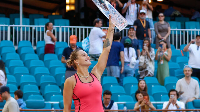 MIAMI GARDENS, FL - MARCH 28: Aryna Sabalenka celebrates with the winners trophy after the women's final singles match against Coco Gauff (USA) (not pictured) at the Miami Open on March 28, 2026, at Hard Rock Stadium in Miami Gardens, Florida,