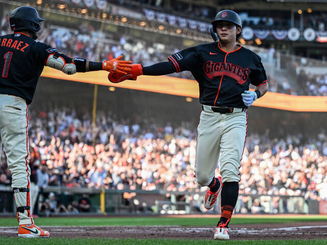 SAN FRANCISCO, CALIFORNIA - MARCH 28: Jung Hoo Lee #51 of the San Francisco Giants scores against the New York Yankees in the third inning at Oracle Park on March 28, 2026 in San Francisco, California.
