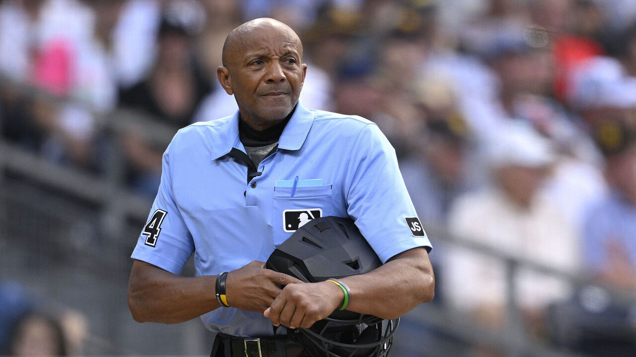 SAN DIEGO, CALIFORNIA - AUGUST 09: Home plate umpire CB Bucknor looks on during the third inning of the game between the San Diego Padres and the Boston Red Sox at Petco Park on August 09, 2025 in San Diego, California.