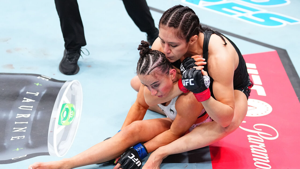 SEATTLE, WASHINGTON - MARCH 28: (R-L) Alexa Grasso of Mexico secures a rear choke submission against Maycee Barber in a flyweight fight during the UFC Fight Night event at Climate Pledge Arena on March 28, 2026 in Seattle, Washington.