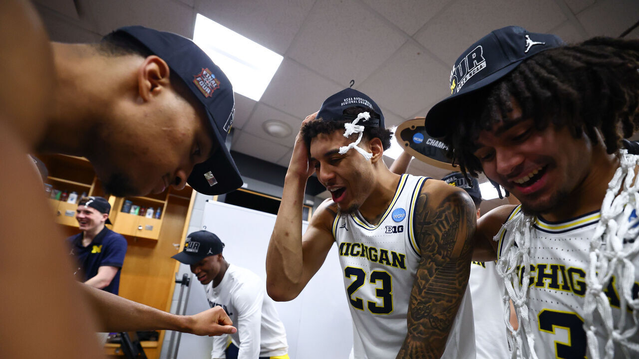 CHICAGO, ILLINOIS - MARCH 29: The Michigan Wolverines celebrate after the game against the Tennessee Volunteers of the Elite Eight round game of the 2026 NCAA Men's Basketball Tournament held at the United Center on March 29, 2026 in Chicago, Illinois.