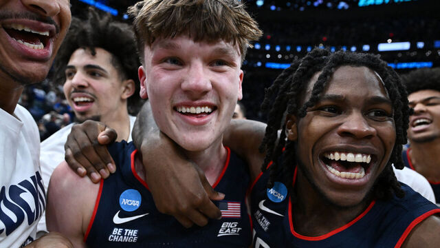 WASHINGTON, DC - MARCH 29: Braylon Mullins #24 of the UConn Huskies celebrates with teammates after hitting the game winning shot in a 73-72 victory against the Duke Blue Devils during the Elite Eight round game of the 2026 NCAA Men's Basketball Tournament held at Capital One Arena on March 29, 2026 in Washington, DC.