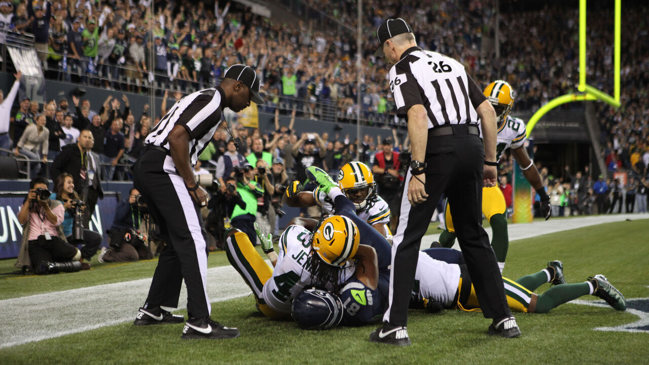 SEATTLE, WA - SEPTEMBER 24: Wide receiver Golden Tate #81 of the Seattle Seahawks makes a catch in the end zone to defeat the Green Bay Packers on a controversial call by the officials at CenturyLink Field on September 24, 2012 in Seattle, Washington.