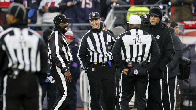 FOXBOROUGH, MA - JANUARY 18: The officials have a laugh during an AFC Divisional Round game between the New England Patriots and the Houston Texans on January 18, 2026, at Gillette Stadium in Foxborough, Massachusetts.