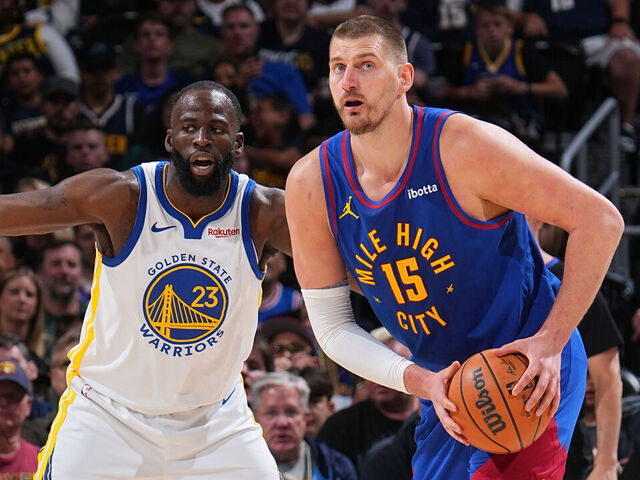 DENVER, CO - MARCH 29: Draymond Green #23 of the Golden State Warriors guards Nikola Jokic #15 of the Denver Nuggets during the game on March 29, 2026 at Ball Arena in Denver, Colorado. NOTE TO USER: User expressly acknowledges and agrees that, by downloading and/or using this Photograph, user is consenting to the terms and conditions of the Getty Images License Agreement. Mandatory Copyright Notice: Copyright 2026 NBAE