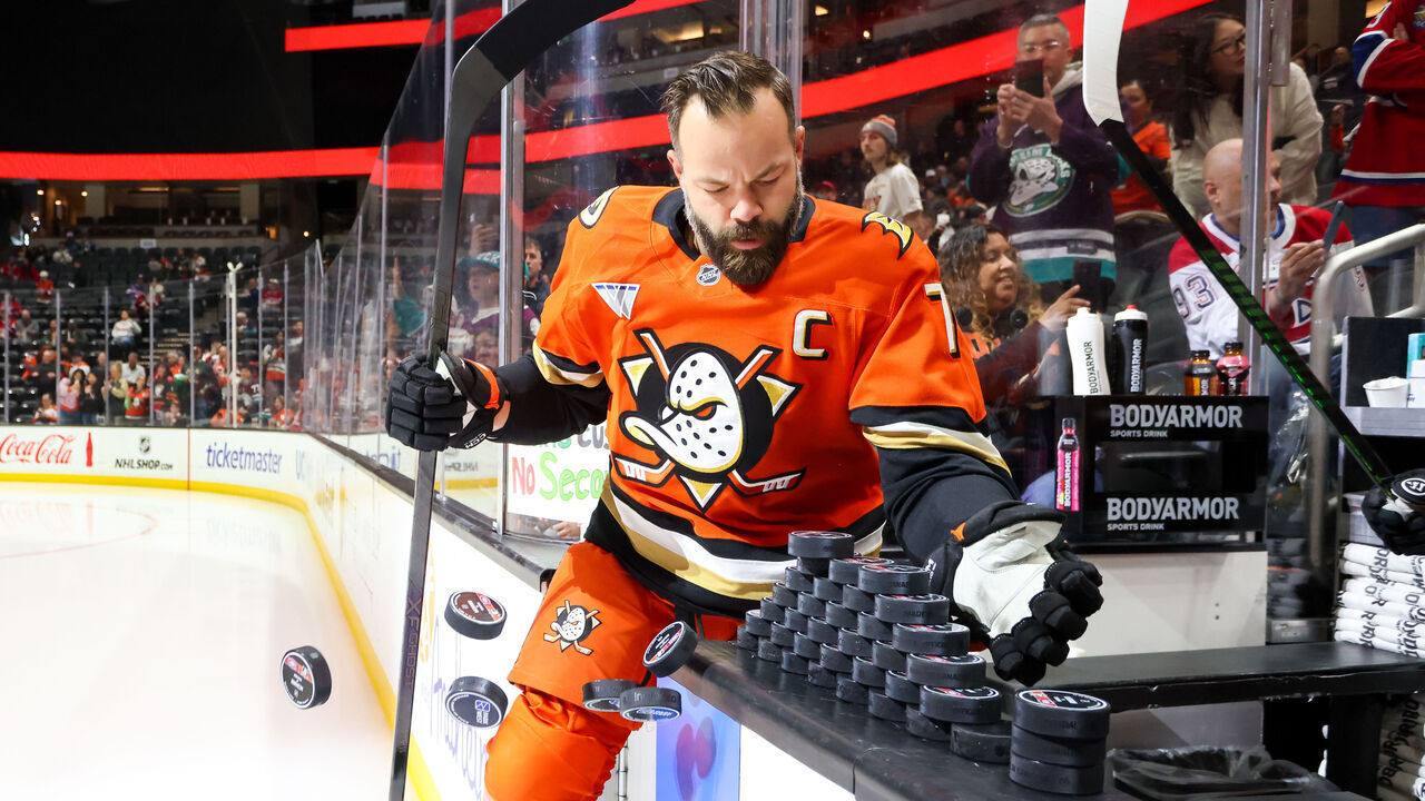 ANAHEIM, CA - MARCH 6: Radko Gudas #7 of the Anaheim Ducks knocks pucks off the boards for use during warm-up as he takes the ice for the game against the Montreal Canadiens at Honda Center on March 6, 2026 in Anaheim, California.