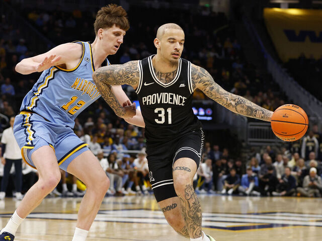 MILWAUKEE, WI - JANUARY 19: Providence Friars forward Duncan Powell (31) pulls a ball in during a game between the Marquette Golden Eagles and the Providence Friars on January 19, 2026 at Fiserv Forum in Milwaukee, WI.