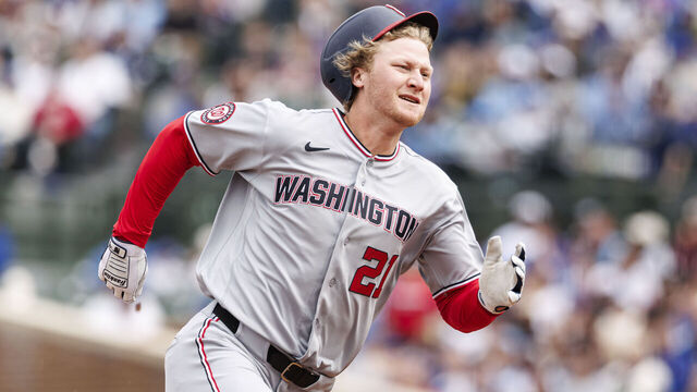CHICAGO, ILLINOIS - MARCH 29: Joey Wiemer #21 of the Washington Nationals runs towards third base for a triple in the fourth inning of a game between the Washington Nationals and the Chicago Cubs at Wrigley Field on March 29, 2026 in Chicago, Illinois.