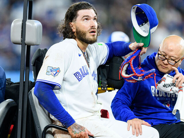 TORONTO, ON - MARCH 30: Toronto Blue Jays Starting Pitcher Cody Ponce (66) is being carted off the field after an injury during the MLB regular season game between the Colorado Rockies and the Toronto Blue Jays on March 30, 2026, at Rogers Centre in Toronto, ON, Canada.