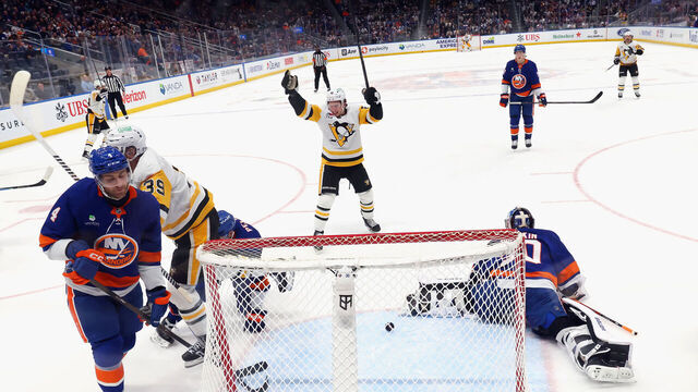 ELMONT, NEW YORK - MARCH 30: Anthony Mantha #39 of the Pittsburgh Penguins scores against Ilya Sorokin #30 of the New York Islanders at during the second period at UBS Arena on March 30, 2026 in Elmont, New York. The Penguins defeated the Islanders 8-3.