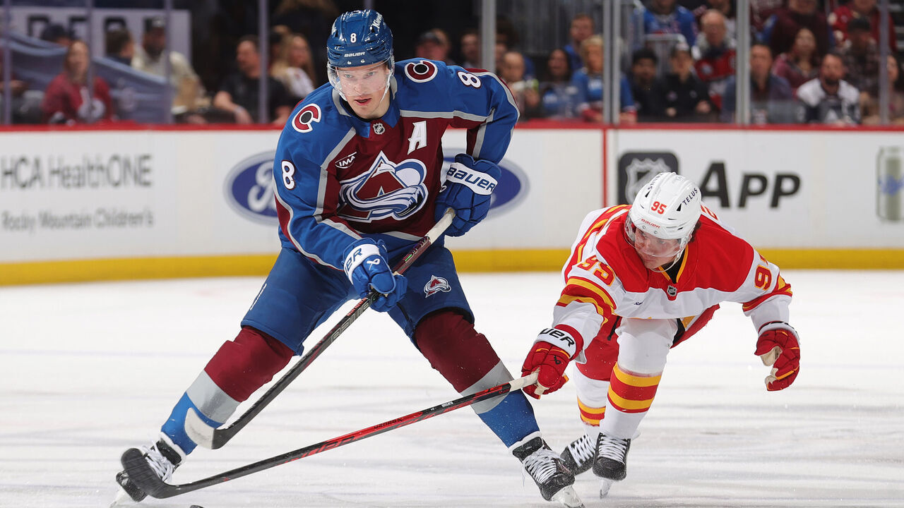 DENVER, COLORADO - MARCH 30: Cale Makar #8 of the Colorado Avalanche skates against Victor Olofsson #95 of the Calgary Flames at Ball Arena on March 30, 2026 in Denver, Colorado.