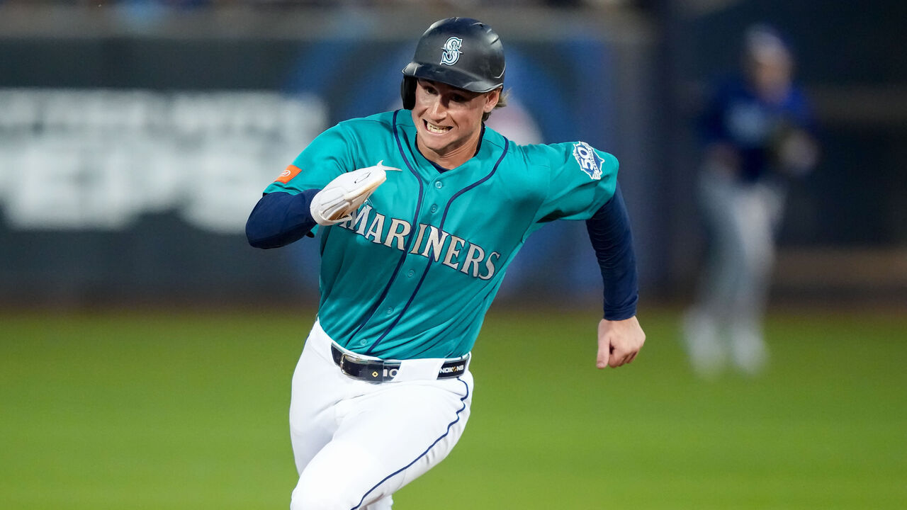 PEORIA, ARIZONA - MARCH 13: Colt Emerson #85 of the Seattle Mariners runs to third base during the second inning against the Los Angeles Dodgers during a spring training game at Peoria Stadium on March 13, 2026 in Peoria, Arizona.