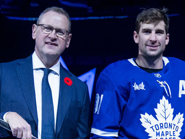 TORONTO, CANADA - NOVEMBER 5: John Tavares #91 of the Toronto Maple Leafs is joined by his family before being presented a golden stick by Toronto Maple Leafs General Manager Brad Treliving for 500 career at the Scotiabank Arena on November 5, 2025 in Toronto, ON, Canada.