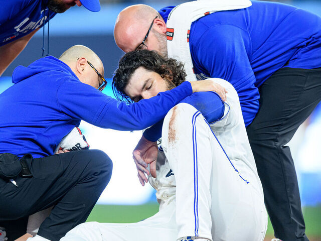 TORONTO, ON - MARCH 30: Toronto Blue Jays Starting Pitcher Cody Ponce (66) reacts after an injury during the MLB regular season game between the Colorado Rockies and the Toronto Blue Jays on March 30, 2026, at Rogers Centre in Toronto, ON, Canada.