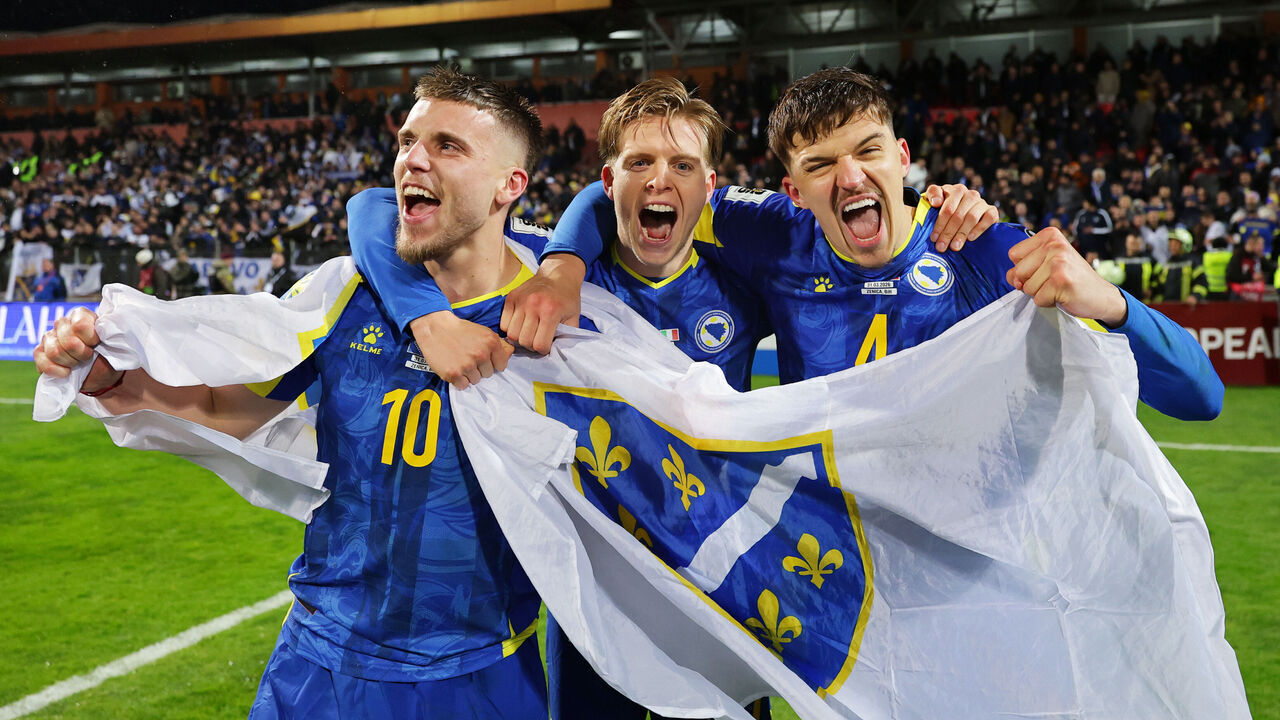 ZENICA, BOSNIA AND HERZEGOVINA - MARCH 31: Ermedin Demirovic, Dzenis Burnic and Tarik Muharemovic of Bosnia and Herzegovina celebrate victory and qualification to the FIFA World Cup 2026 after the FIFA World Cup 2026 European Qualifiers KO play-offs match between Bosnia & Herzegovina and Italy at Stadion Bilino Polje on March 31, 2026 in Zenica, Bosnia and Herzegovina.