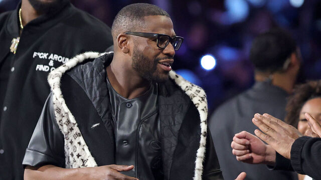 LAS VEGAS, NEVADA - DECEMBER 16: Floyd Mayweather Jr. greets people at halftime of the championship game of the Emirates NBA Cup between the San Antonio Spurs and the New York Knicks at T-Mobile Arena on December 16, 2025 in Las Vegas, Nevada. The Knicks defeated the Spurs 124-113.