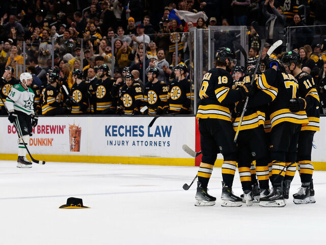 BOSTON, MASSACHUSETTS - MARCH 31: Viktor Arvidsson #71 of the Boston Bruins celebrates his third goal of the game for a hat trick with teammates Charlie McAvoy #73, Casey Mittelstadt #11, and Pavel Zacha #18 against the Dallas Stars during the third period at the TD Garden on March 31, 2026 in Boston, Massachusetts. The Bruins won 6-3.