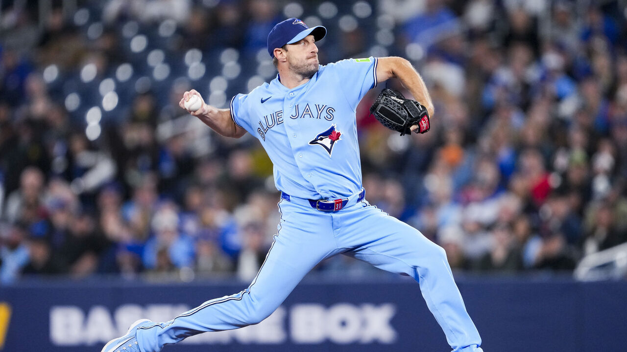 TORONTO, CANADA - MARCH 31: Max Scherzer #31 of the Toronto Blue Jays pitches to the Colorado Rockies during the first inning in their MLB game at the Rogers Centre on March 31, 2026 in Toronto, Ontario, Canada.