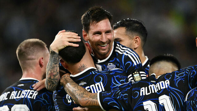 TOPSHOT - Argentina's defender #19 Nicolas Otamendi celebrates with teammate forward #10 Lionel Messi after scoring his team's third goal during a friendly football match between Argentina and Zambia at La Bombonera stadium in Buenos Aires on March 31, 2026.