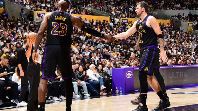 LOS ANGELES, CA - MARCH 31: LeBron James #23 and Luka Doncic #77 of the Los Angeles Lakers high five during the game against the Cleveland Cavaliers on March 31, 2026 at Crypto.Com Arena in Los Angeles, California. NOTE TO USER: User expressly acknowledges and agrees that, by downloading and/or using this Photograph, user is consenting to the terms and conditions of the Getty Images License Agreement. Mandatory Copyright Notice: Copyright 2026 NBAE