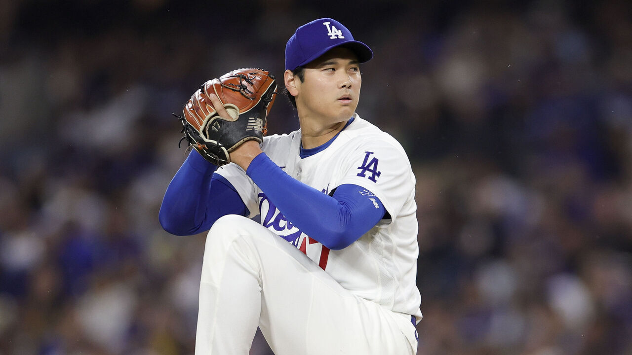 LOS ANGELES, CALIFORNIA - MARCH 31: Shohei Ohtani #17 of the Los Angeles Dodgers throws during the first inning of a baseball game against the Cleveland Guardians at Dodger Stadium on March 31, 2026 in Los Angeles, California.
