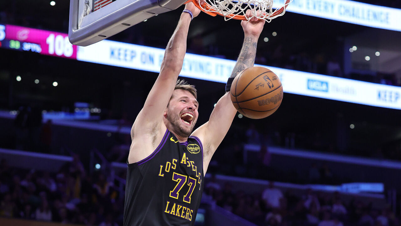 LOS ANGELES, CALIFORNIA - MARCH 31: Luka Doncic #77 of the Los Angeles Lakers makes a slam dunk against the Cleveland Cavaliers in the second half at Crypto.com Arena on March 31, 2026 in Los Angeles, California.