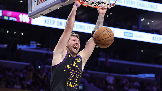 LOS ANGELES, CALIFORNIA - MARCH 31: Luka Doncic #77 of the Los Angeles Lakers makes a slam dunk against the Cleveland Cavaliers in the second half at Crypto.com Arena on March 31, 2026 in Los Angeles, California.