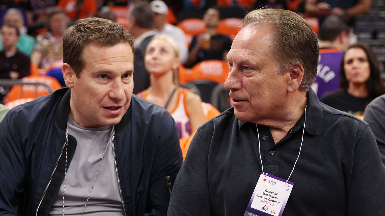 PHOENIX, ARIZONA - APRIL 25: Phoenix Suns owner Mat Ishbia and Michigan State University head basketball coach Tom Izzo talk prior to game five of the Western Conference First Round Playoffs between the LA Clippers and the Phoenix Suns at Footprint Center on April 25, 2023 in Phoenix, Arizona.