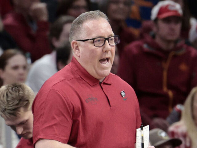BOSTON, MA - MARCH 28: Iowa State Cyclones assistant coach Kyle Green yells instructions during an NCAA Sweet Sixteen game between the Iowa State Cyclones and the Illinois Fighting Illini on March 28, 2024, at TD Garden in Boston, Massachusetts.