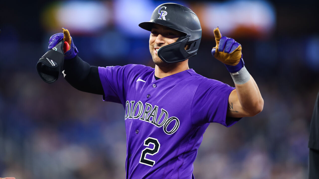 TORONTO, CANADA - APRIL 1: Tyler Freeman #2 of the Colorado Rockies reacts as he hits an RBI single to score in Brenton Doyle #9 in the tenth inning of their MLB game against the Toronto Blue Jays at Rogers Centre on April 1, 2026 in Toronto, Ontario, Canada.