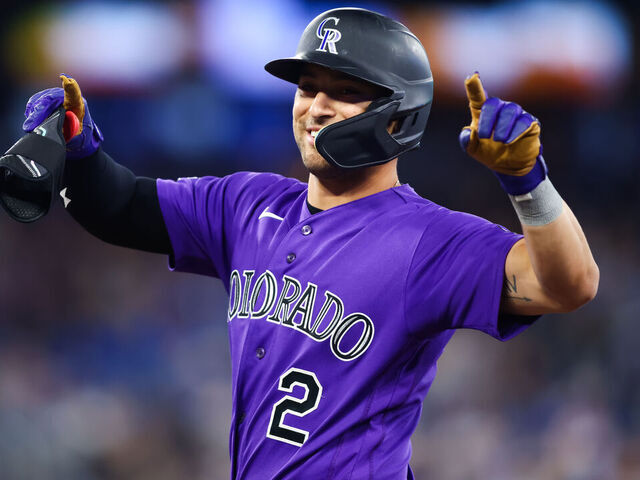 TORONTO, CANADA - APRIL 1: Tyler Freeman #2 of the Colorado Rockies reacts as he hits an RBI single to score in Brenton Doyle #9 in the tenth inning of their MLB game against the Toronto Blue Jays at Rogers Centre on April 1, 2026 in Toronto, Ontario, Canada.