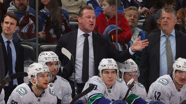 DENVER, COLORADO - APRIL 01: Head coach Adam Foote of the Vancouver Canucks talks during the second period against the Colorado Avalanche at Ball Arena on April 1, 2026 in Denver, Colorado.