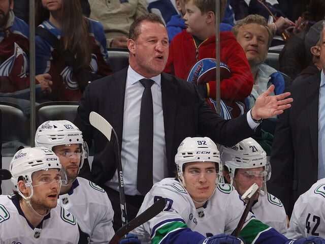 DENVER, COLORADO - APRIL 01: Head coach Adam Foote of the Vancouver Canucks talks during the second period against the Colorado Avalanche at Ball Arena on April 1, 2026 in Denver, Colorado.