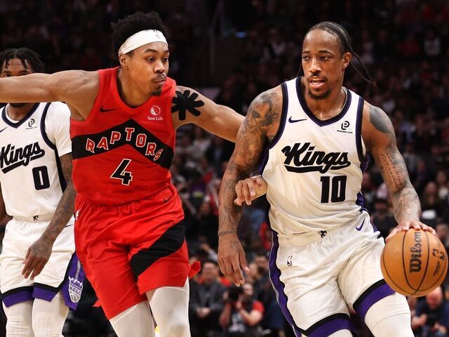 TORONTO, ON - April 1 In second half action, Scottie Barnes (4) of the Toronto Raptors shadows DeMar DeRozan (10) of the Sacramento Kings as he makes his way up court.The Toronto Raptors lost to the Sacramento Kings 115-123 in NBA basketball action at the Scotiabank Arena. April 1 2026 Richard Lautens/Toronto Star (Richard Lautens/Toronto Star via Getty Images)
