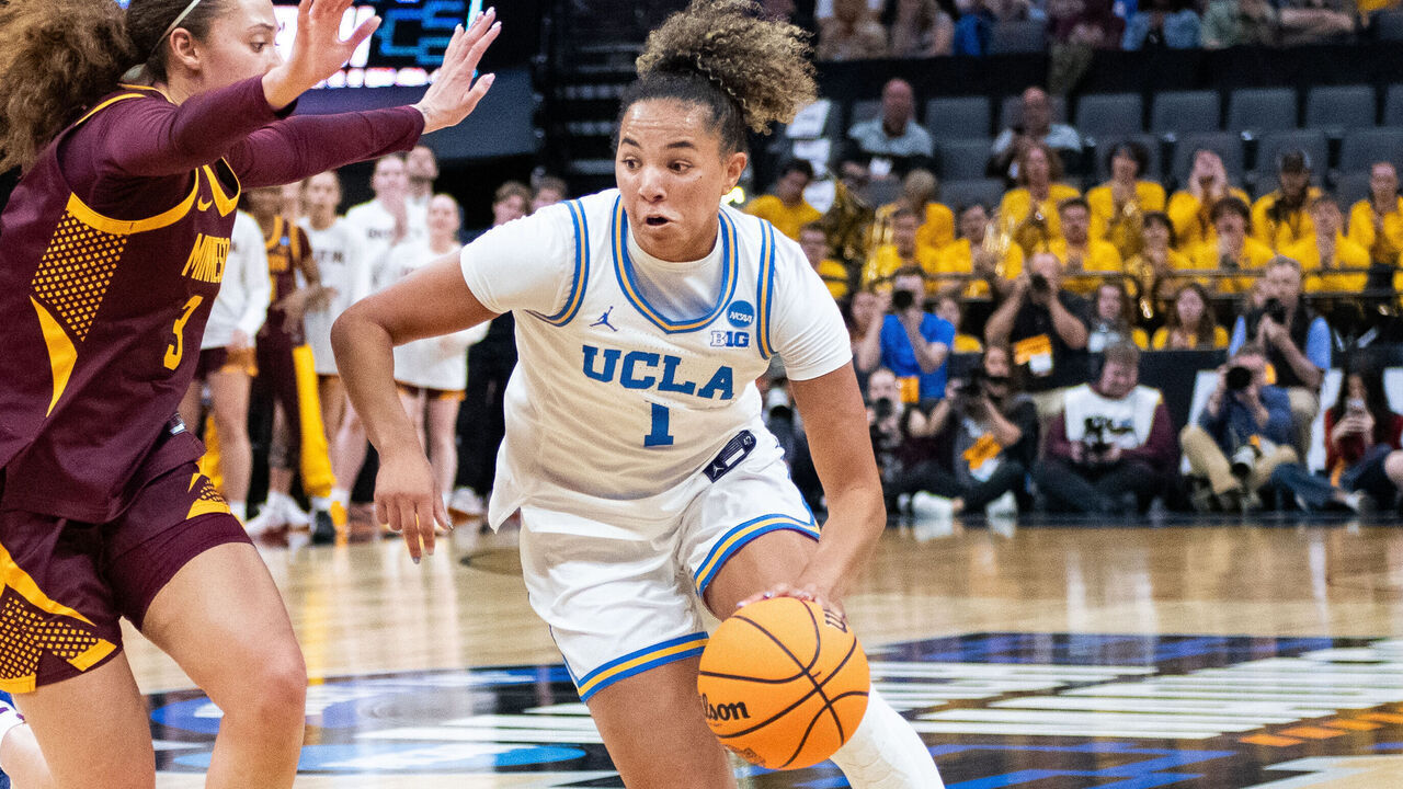 SACRAMENTO, CA - MARCH 27: Kiki Rice #1 of the UCLA Bruins drives to the basket during the second half of a game between University of Minnesota and University of California, Los Angeles at Golden 1 Center on March 27, 2026 in Sacramento, California.