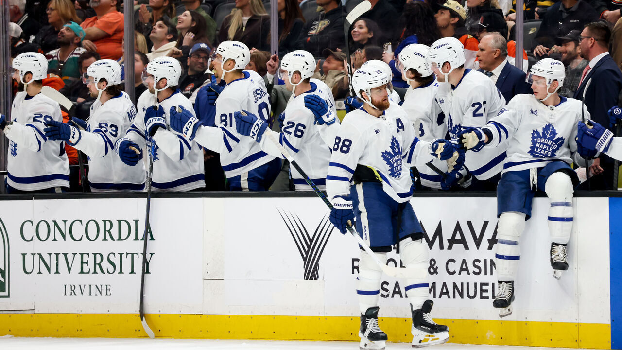 ANAHEIM, CA - MARCH 30: John Tavares #91 of the Toronto Maple Leafs celebrates his goal with teammates during the third period against the Anaheim Ducks at Honda Center on March 30, 2026 in Anaheim, California.