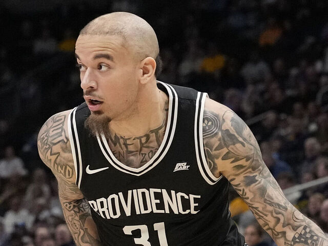MILWAUKEE, WISCONSIN - JANUARY 19: Duncan Powell #31 of the Providence Friars dribbles the ball against the Marquette Golden Eagles during the second half at Fiserv Forum on January 19, 2026 in Milwaukee, Wisconsin.