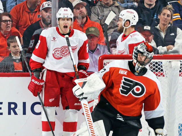 PHILADELPHIA, PENNSYLVANIA - APRIL 02: Patrick Kane #88 of the Detroit Red Wings reacts while celebrating with Alex DeBrincat #93 after scoring a third period goal against Samuel Ersson #33 of the Philadelphia Flyers at the Xfinity Mobile Arena on April 2, 2026 in Philadelphia, Pennsylvania.