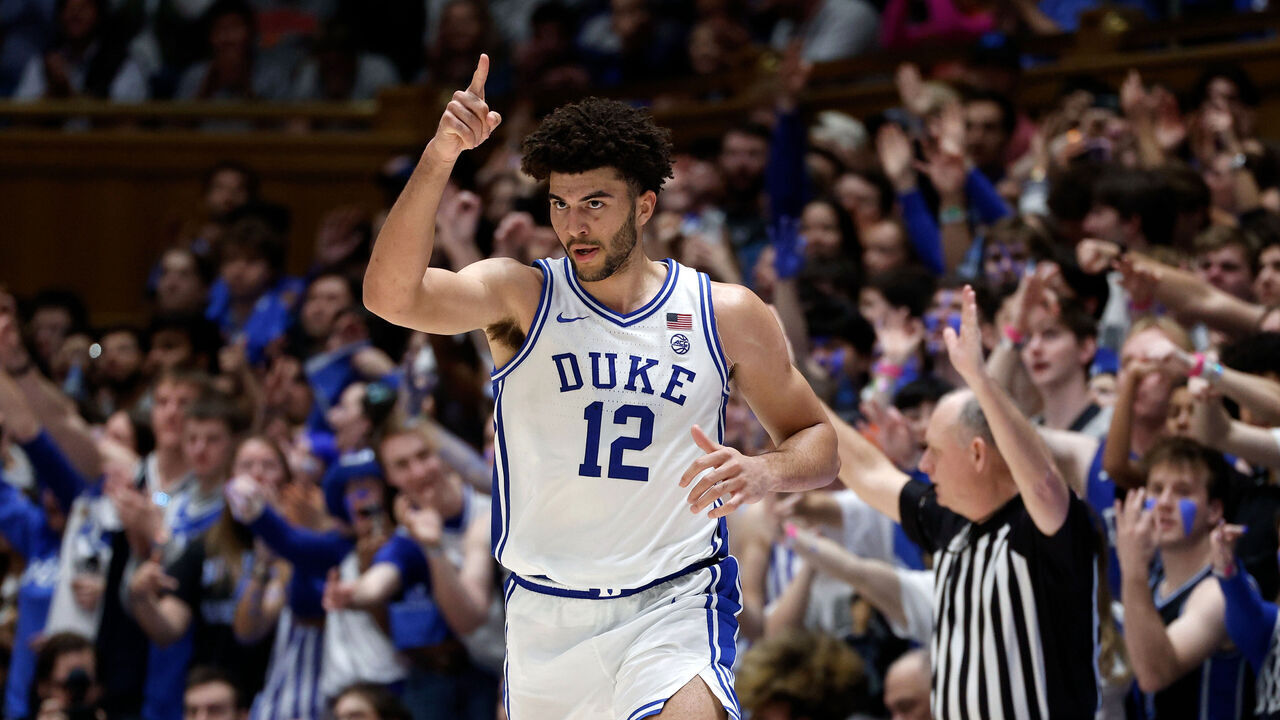 DURHAM, NORTH CAROLINA - FEBRUARY 14: Cameron Boozer #12 of the Duke Blue Devils reacts following a three-point basket during the second half against the Clemson Tigers at Cameron Indoor Stadium on February 14, 2026 in Durham, North Carolina.